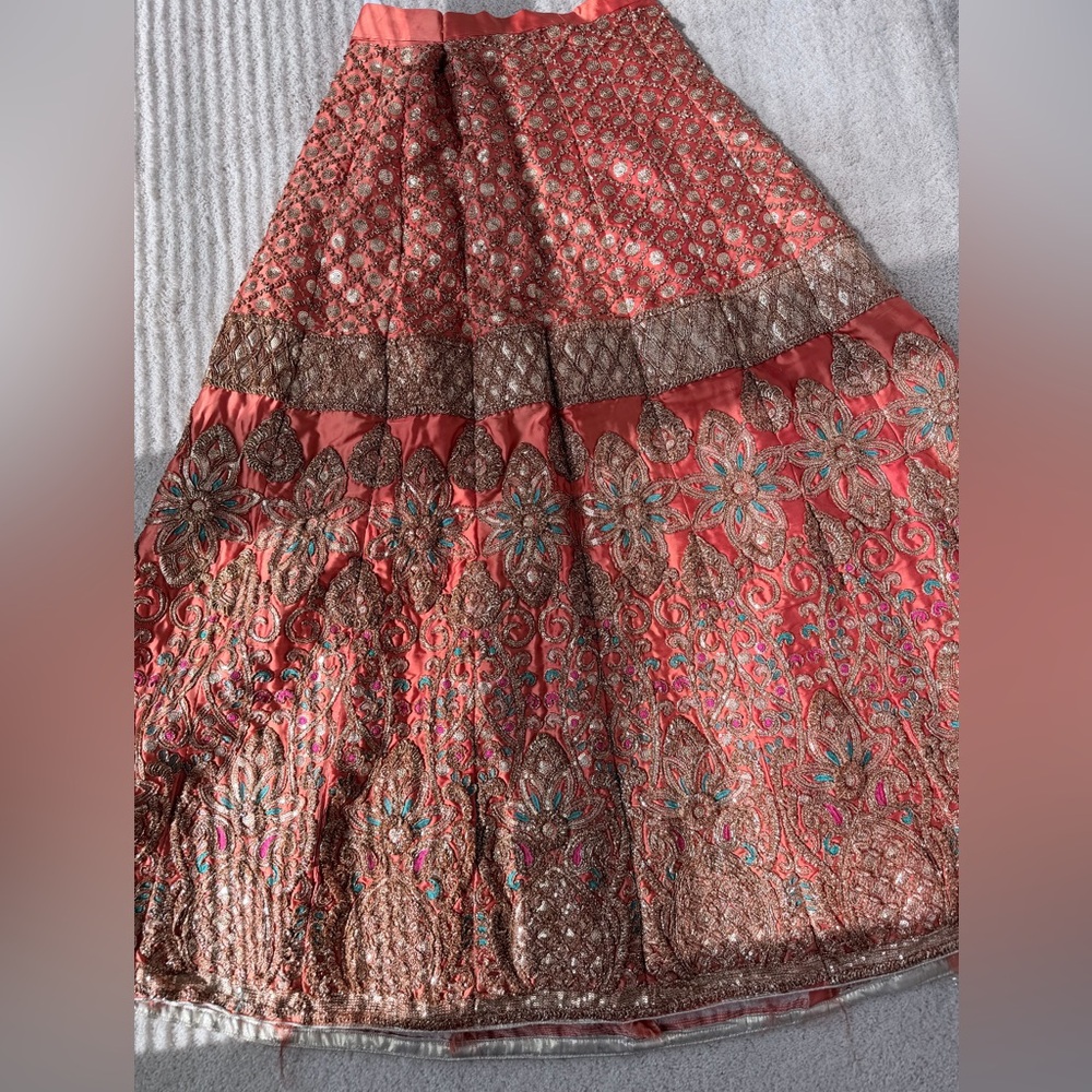 Stunning Orange and Gold Lehenga Suit